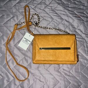 Madison West women's mustard crossbody clutch (detachable strap) bag
